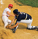 Baseball Player sliding into home