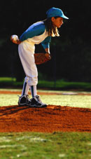 Girl pitcher on baseball mound