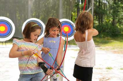Young girls at archery range