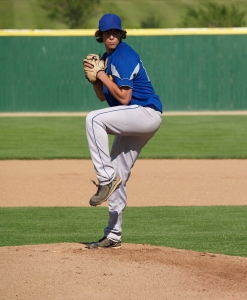 High school baseball pitcher in the windup