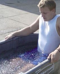 Athlete in ice water bath