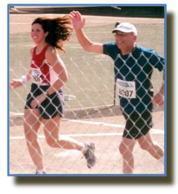 Lisa McDowell and her dad cross finish line at Disney marathon