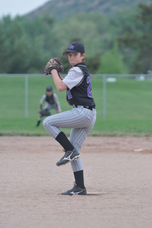 Young pitcher in stretch position