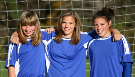 Three female soccer players 