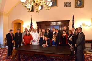 Ohio governor John Kasich signs concussion safety law